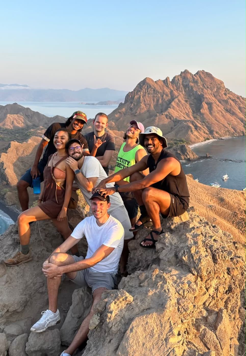 A Pangea group on the ridge at Padar Island at sunset